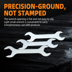 Thin double open end wrench with dual size openings and slim head design